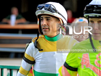 Jockey Rafael Hernandez enters the walking ring ahead of the 134th running of the $400,000 Breeders' Stakes, the third race of the OLG Canad...