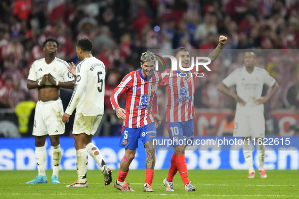 Angel Correa right winger of Atletico de Madrid and Argentina celebrates after scoring his sides first goal during the LaLiga match between...