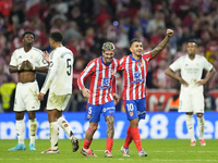 Angel Correa right winger of Atletico de Madrid and Argentina celebrates after scoring his sides first goal during the LaLiga match between...