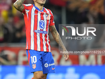 Angel Correa right winger of Atletico de Madrid and Argentina celebrates after scoring his sides first goal during the LaLiga match between...