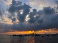 The sunset shines on the beach of Gujia Island in the West Coast New Area of Qingdao, Shandong province, China, on September 29, 2024. (