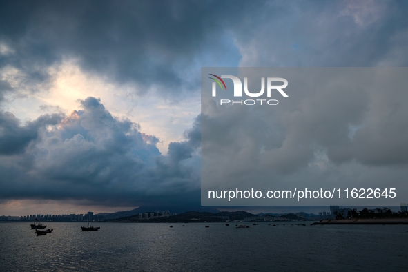 The sunset shines on the beach of Gujia Island in the West Coast New Area of Qingdao, Shandong province, China, on September 29, 2024. 