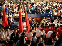 A large number of audience members and actors sing ''Me and My Motherland'' together at the celebration of the 75th anniversary of the found...