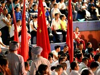 A large number of audience members and actors sing ''Me and My Motherland'' together at the celebration of the 75th anniversary of the found...