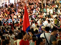 A large number of audience members and actors sing ''Me and My Motherland'' together at the celebration of the 75th anniversary of the found...