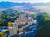 Buildings under construction are seen around the Yesban community in Anqing, China, on September 30, 2024. (