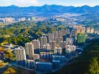 Buildings under construction are seen around the Yesban community in Anqing, China, on September 30, 2024. (