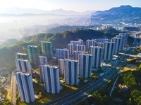 Buildings under construction are seen around the Yesban community in Anqing, China, on September 30, 2024. (