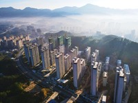 Buildings under construction are seen around the Yesban community in Anqing, China, on September 30, 2024. (