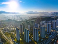 Buildings under construction are seen around the Yesban community in Anqing, China, on September 30, 2024. (