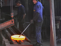 A worker works at an auto gear manufacturing company in Qingzhou Economic Development Zone in Qingzhou, China, on September 30, 2024. On the...