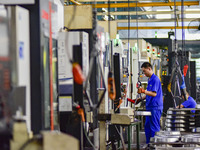 A worker works at an auto gear manufacturing company in Qingzhou Economic Development Zone in Qingzhou, China, on September 30, 2024. On the...