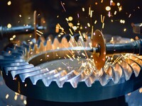 A worker works at an auto gear manufacturing company in Qingzhou Economic Development Zone in Qingzhou, China, on September 30, 2024. On the...