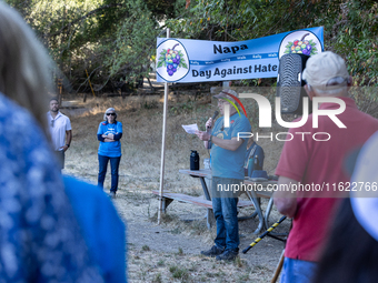 Napa community members participate in the inaugural Napa Day Against Hate at Westwood Hills Park, in Napa, Calif., on July 29, 2024. Rabbi N...