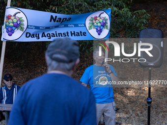 Napa community members participate in the inaugural Napa Day Against Hate at Westwood Hills Park, in Napa, Calif., on July 29, 2024. Dr. Pet...