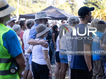 Napa community members participate in the inaugural Napa Day Against Hate at Westwood Hills Park in Napa, California, on July 29, 2024. (