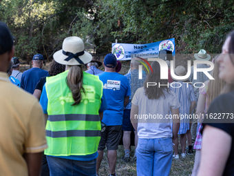 Napa community members participate in the inaugural Napa Day Against Hate at Westwood Hills Park in Napa, California, on July 29, 2024. (