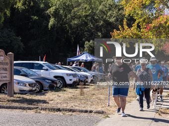 Napa community members participate in the inaugural Napa Day Against Hate at Westwood Hills Park in Napa, California, on July 29, 2024. (