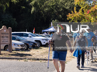 Napa community members participate in the inaugural Napa Day Against Hate at Westwood Hills Park in Napa, California, on July 29, 2024. (