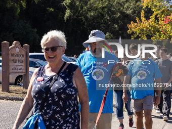 Napa community members participate in the inaugural Napa Day Against Hate at Westwood Hills Park in Napa, California, on July 29, 2024. (