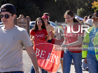 Napa community members participate in the inaugural Napa Day Against Hate at Westwood Hills Park in Napa, California, on July 29, 2024. (