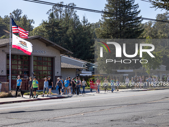 Napa community members participate in the inaugural Napa Day Against Hate at Westwood Hills Park in Napa, California, on July 29, 2024. (