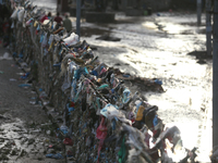 Plastics remain entangled in the bars along the embankments of Bagmati River in Kathmandu, Nepal, on September 29, 2024. Nepal on Saturday,...