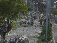 Plastics remain entangled in the branches of trees and infrastructures along the embankments of the Bagmati River in Kathmandu, Nepal, on Se...