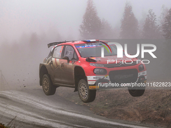 Driver Yohan Rossel and co-driver Arnaud Dunand of the team AEC - DG Sport Competition Citroen C3 face the third day of the race during the...