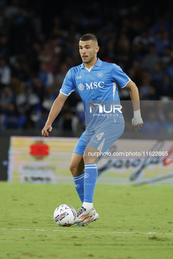 Napoli's Alessandro Buongiorno controls the ball during the Serie A soccer match SSC Napoli vs. Monza at Stadio Maradona in Naples, Italy, o...