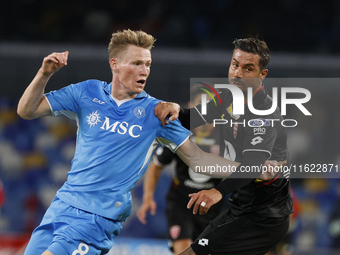 Scott McTominay and Monza's Armando Izzo participate in the Serie A soccer match between SSC Napoli and Monza at Stadio Maradona in Naples,...