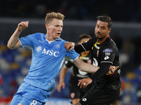 Scott McTominay and Monza's Armando Izzo participate in the Serie A soccer match between SSC Napoli and Monza at Stadio Maradona in Naples,...