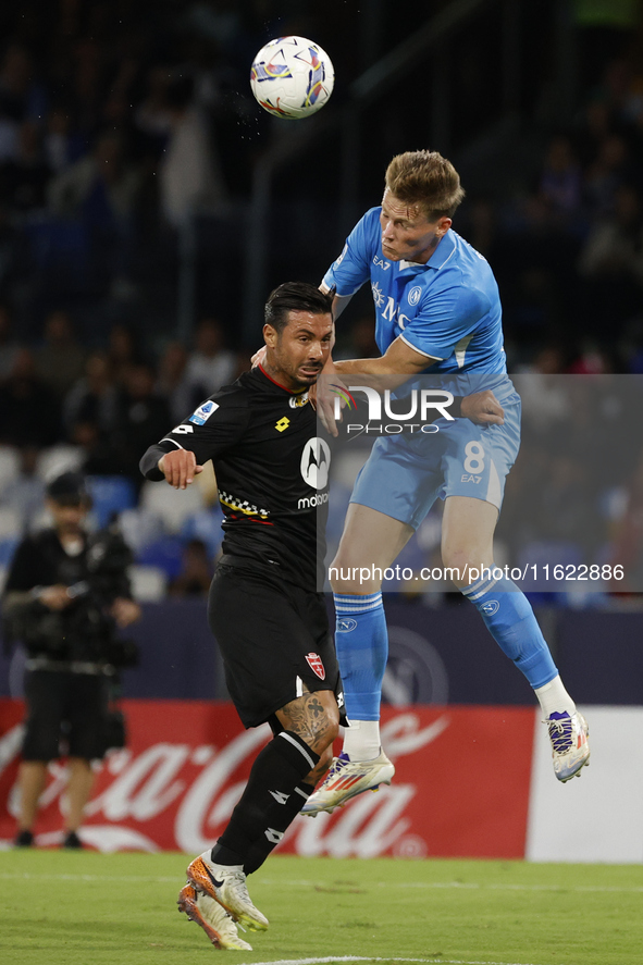 Napoli's Scott McTominay and Monza's Armando Izzo are seen in action during the Serie A soccer match SSC Napoli vs. Monza at Stadio Maradona...