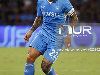 Napoli's Giovanni Di Lorenzo controls the ball during the Serie A soccer match between SSC Napoli and Monza at Stadio Maradona in Naples, It...