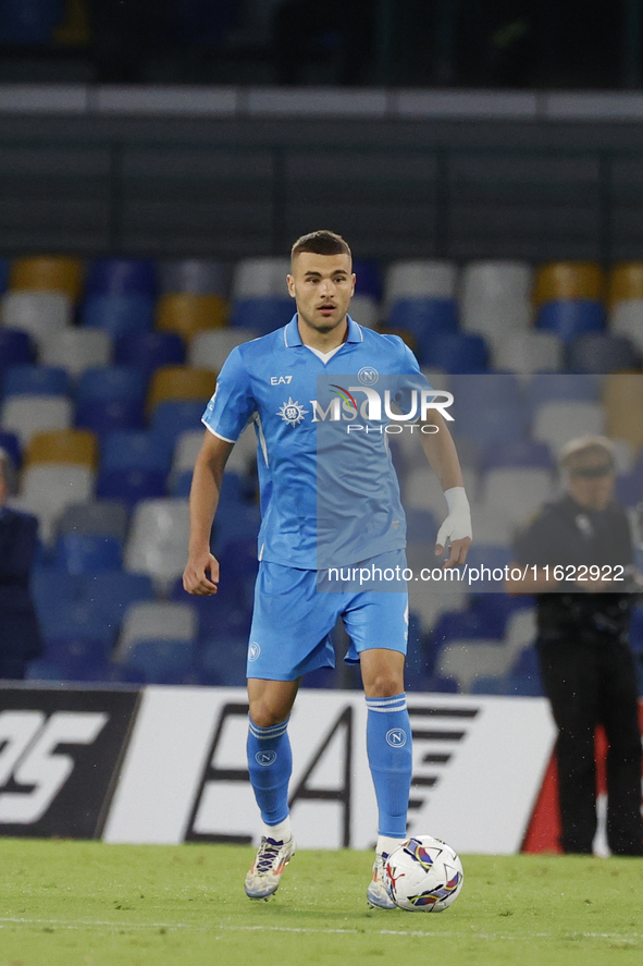 Napoli's Alessandro Buongiorno controls the ball during the Serie A soccer match between SSC Napoli and Monza at Stadio Maradona in Naples,...