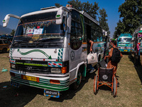 Kashmiri polling officials carry sealed Electronic Voting Machines (EVM) and Voter Verifiable Paper Audit Trail (VVPAT) machines as they mov...