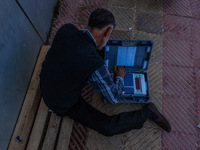 Kashmiri polling officials carry sealed Electronic Voting Machines (EVM) and Voter Verifiable Paper Audit Trail (VVPAT) machines as they mov...