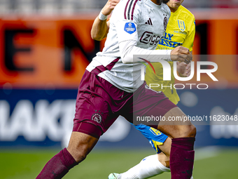 AFC Ajax Amsterdam defender Devyne Rensch and RKC player Dario van de Buijs during the match RKC - Ajax at the Mandemakers Stadium for the D...