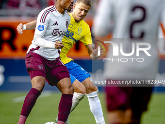 AFC Ajax Amsterdam defender Devyne Rensch and RKC player Dario van de Buijs during the match RKC - Ajax at the Mandemakers Stadium for the D...