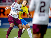 AFC Ajax Amsterdam defender Devyne Rensch and RKC player Dario van de Buijs during the match RKC - Ajax at the Mandemakers Stadium for the D...