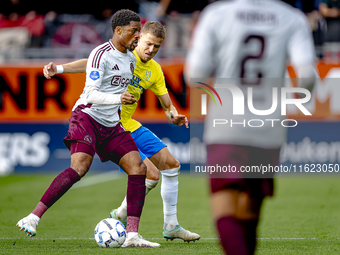 AFC Ajax Amsterdam defender Devyne Rensch and RKC player Dario van de Buijs during the match RKC - Ajax at the Mandemakers Stadium for the D...