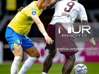 RKC player Dario van de Buijs and AFC Ajax Amsterdam forward Brian Brobbey during the match RKC vs. Ajax at the Mandemakers Stadium for the...