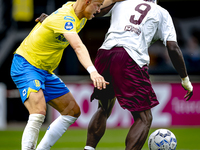 RKC player Dario van de Buijs and AFC Ajax Amsterdam forward Brian Brobbey during the match RKC vs. Ajax at the Mandemakers Stadium for the...