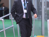 Jonathan Gullis arrives in the pouring rain at the Conservative Party Conference at the International Conference Centre in Birmingham, Engla...