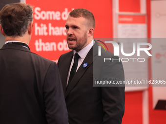 Jonathan Gullis talks to Channel 4 correspondent Gary Gibbon at the Conservative Party Conference at the International Conference Centre in...