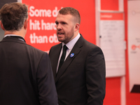 Jonathan Gullis talks to Channel 4 correspondent Gary Gibbon at the Conservative Party Conference at the International Conference Centre in...