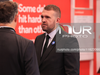 Jonathan Gullis talks to Channel 4 correspondent Gary Gibbon at the Conservative Party Conference at the International Conference Centre in...