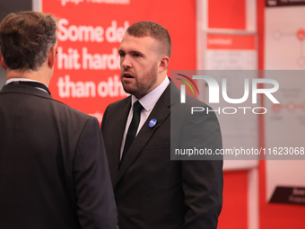 Jonathan Gullis talks to Channel 4 correspondent Gary Gibbon at the Conservative Party Conference at the International Conference Centre in...