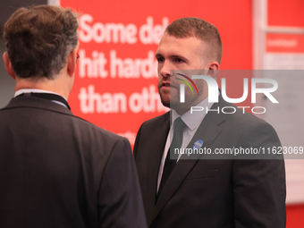 Jonathan Gullis talks to Channel 4 correspondent Gary Gibbon at the Conservative Party Conference at the International Conference Centre in...