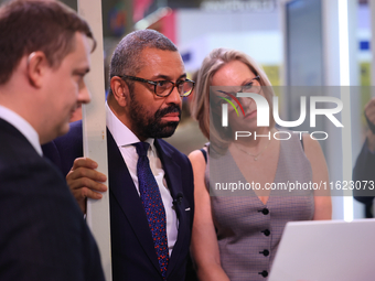 James Cleverly MP and his wife Susannah Cleverly talk to Animal Free Research UK at the Conservative Party Conference at the International C...